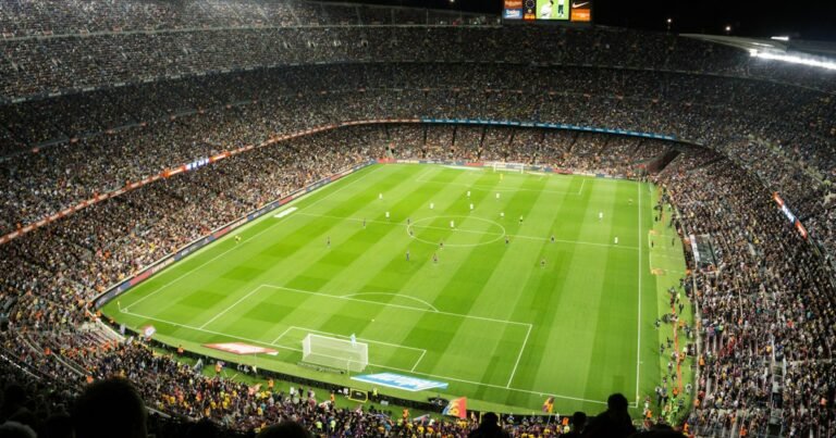 Football teams competing in a stadium match
