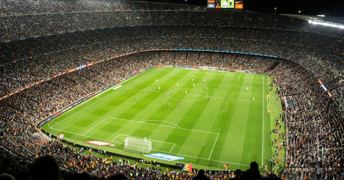 Football teams competing in a stadium match
