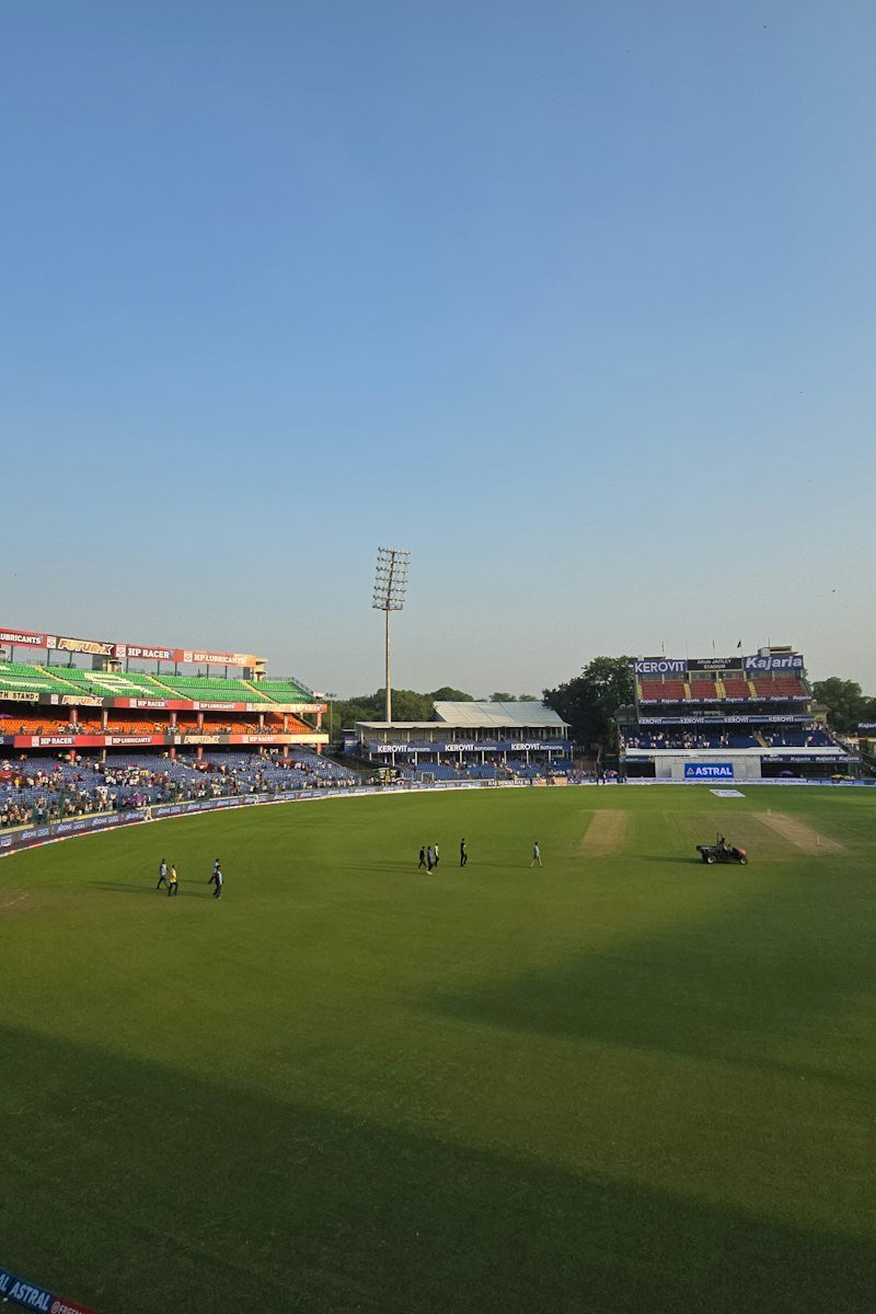 Delhi cricket stadium viewed across the field
