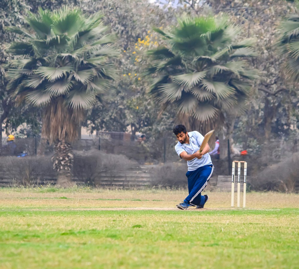 Cricket player playing a shot